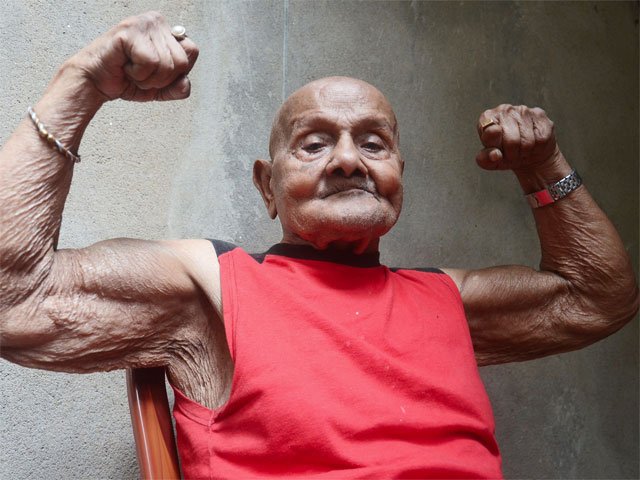 Former Mr Universe and celebrated body-builder Manohar Aich died at his home here following old age-related health complications, family sources said. He was 104. Manohar Aich,Manohar Aich passes away,Former Mr. Universe Manohar Aich passes away,Manohar Aich dead,Manohar Aich died,Manohar Aich rare pics,Manohar Aich rare images,Manohar Aich rare photos,Manohar Aich rare stills,Manohar Aich rare pictures