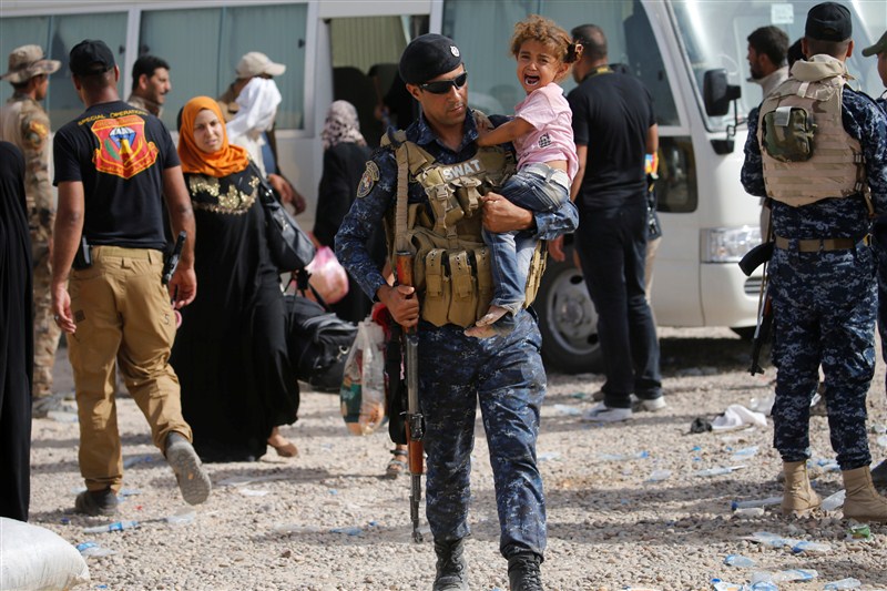 A boat carrying fleeing civilians across a river from Falluja sank, killing at least four people, as pro-Baghdad forces almost completely encircled the Islamic State stronghold. Islamic State Militants,Islamic State,Civilians Fleeing Fallujah,Fleeing Fallujah,Falluja sank,pro-Baghdad,Islamic State stronghold