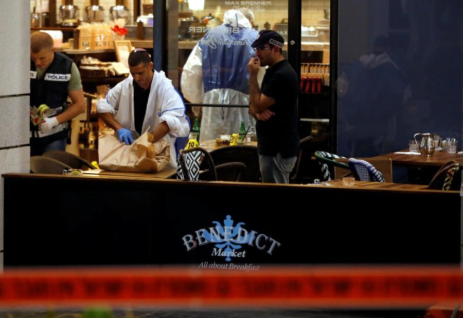 Several casualties are reported in a shooting incident in the center of Tel Aviv. Tel Aviv,Tel Aviv terror attack,Israeli policeman,Tel Aviv terror attack pics,Tel Aviv terror attack images,Tel Aviv terror attack photos,Tel Aviv terror attack stills,Tel Aviv terror attack pictures,4 killed in Tel Aviv terror attack,Tel Aviv shooting,Te