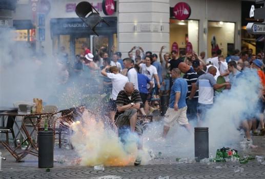 Euro 2016 tournament begins with tear gas and clashes between Marseille locals and England fans.