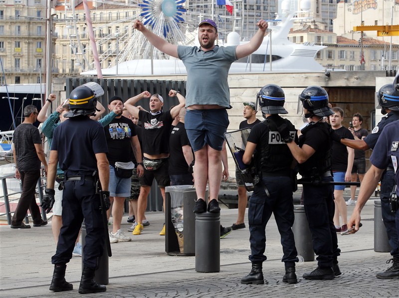 Euro 2016 tournament begins with tear gas and clashes between Marseille locals and England fans. Euro 2016,Marseille locals and England fans,Marseille locals,England fans,Euro 2016 tournament,France
