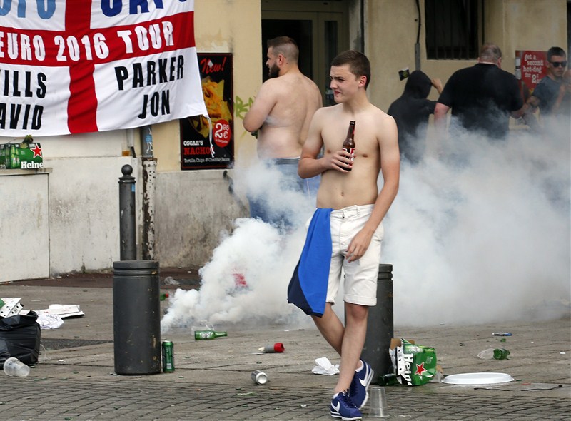 Euro 2016 tournament begins with tear gas and clashes between Marseille locals and England fans. Euro 2016,Marseille locals and England fans,Marseille locals,England fans,Euro 2016 tournament,France