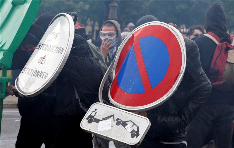 Protesters clash with police against plans to loosen the country's protective labor law. France protests labor reforms,France protests labor,France labour protest turns violent,France protest turns violent,labour protest turns violent,labour protest