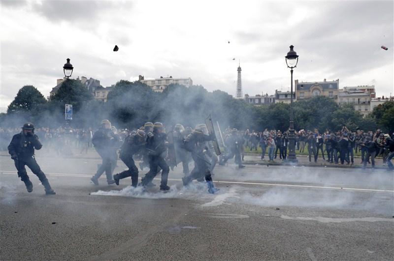 Protesters clash with police against plans to loosen the country's protective labor law. France protests labor reforms,France protests labor,France labour protest turns violent,France protest turns violent,labour protest turns violent,labour protest