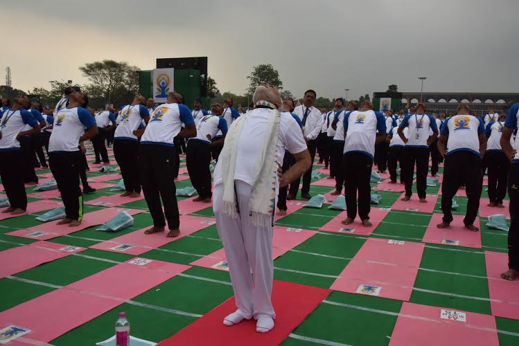 Thousands of people across the country began the day on Tuesday with yoga exercises to mark the second International Yoga Day. International Yoga Day,International Yoga Day 2016,International Yoga Day events,International Yoga Day event,Chandigarh,Yoga Chandigarh event,Modi,Narendra Modi,Record-breaking International Yoga Day events begin