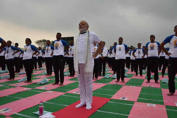 Thousands of people across the country began the day on Tuesday with yoga exercises to mark the second International Yoga Day. International Yoga Day,International Yoga Day 2016,International Yoga Day events,International Yoga Day event,Chandigarh,Yoga Chandigarh event,Modi,Narendra Modi,Record-breaking International Yoga Day events begin