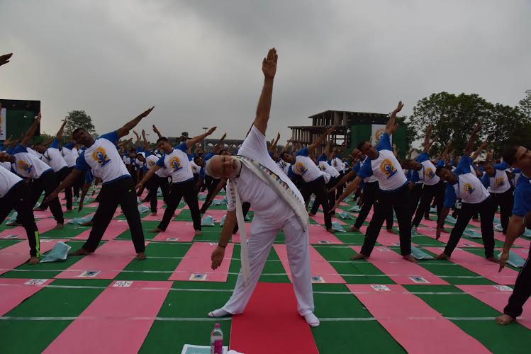Thousands of people across the country began the day on Tuesday with yoga exercises to mark the second International Yoga Day. International Yoga Day,International Yoga Day 2016,International Yoga Day events,International Yoga Day event,Chandigarh,Yoga Chandigarh event,Modi,Narendra Modi,Record-breaking International Yoga Day events begin