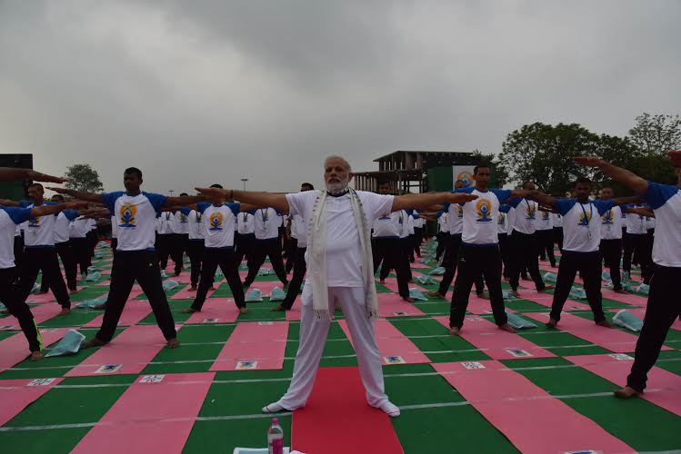 Thousands of people across the country began the day on Tuesday with yoga exercises to mark the second International Yoga Day. International Yoga Day,International Yoga Day 2016,International Yoga Day events,International Yoga Day event,Chandigarh,Yoga Chandigarh event,Modi,Narendra Modi,Record-breaking International Yoga Day events begin