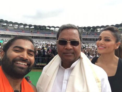 Bollywood actress Bipasha Basu joins Karnataka Chief Minister Siddaramaiah for Yoga Day celebrations in Bangalore.