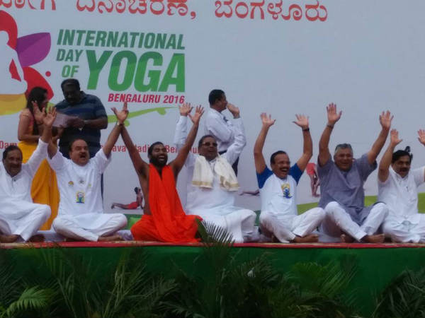 Bollywood actress Bipasha Basu joins Karnataka Chief Minister Siddaramaiah for Yoga Day celebrations in Bangalore. Yoga Day celebrations,Bipasha Basu joins Siddaramaiah,Bipasha Basu,Siddaramaiah,Bipasha Basu and Siddaramaiah,Siddaramaiah and Bipasha Basu,Bipasha Basu yoga,yoga celebrations,yoga celebration pics,yoga celebration images,yoga celebration photos,yoga cele