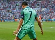 Captain Cristiano Ronaldo scored twice in the second half as Portugal managed to hold Hungary 3-3 in a Group F match and qualified for the pre-quarterfinals of the Euro football championship on Wednesday.
