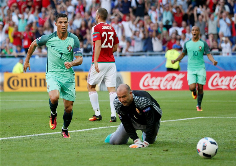Captain Cristiano Ronaldo scored twice in the second half as Portugal managed to hold Hungary 3-3 in a Group F match and qualified for the pre-quarterfinals of the Euro football championship on Wednesday. Cristiano Ronaldo,Euro Cup 2016,Portugal to Euro pre-quarters,Euro football championship,Euro football,Euro football 2016