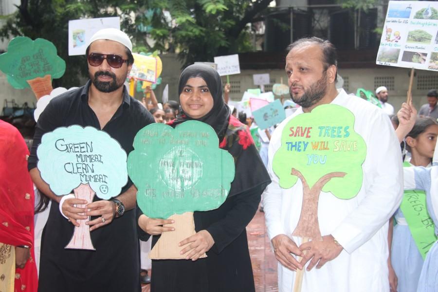 Philanthropist Asif Bhamla and Ajaz Khan at 'Van Mahotsav Week' tree plantation drive in association with Bhamla Foundation & Anjuman Islam Girls School, Bandra. Bhamla Foundation,Ajaz Khan,Van Mahotsav Week,Philanthropist Asif Bhamla,tree plantation,planting tree,Anjuman Islam Girls School