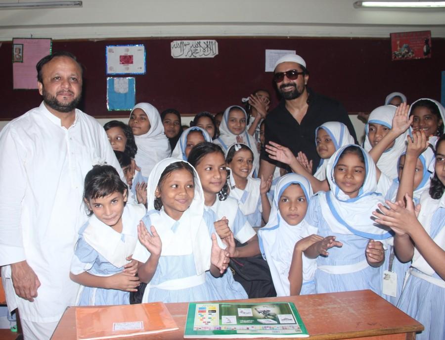 Philanthropist Asif Bhamla and Ajaz Khan at 'Van Mahotsav Week' tree plantation drive in association with Bhamla Foundation & Anjuman Islam Girls School, Bandra. Bhamla Foundation,Ajaz Khan,Van Mahotsav Week,Philanthropist Asif Bhamla,tree plantation,planting tree,Anjuman Islam Girls School