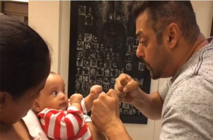 Bollywood actor Salman Khan teaches Sultan moves to his Nephew Ahil. Salman Khan,Salman Khan teaches Sultan moves to his Nephew Ahil,Ahil,Sultan,Sultan moves to his Nephew Ahil,Nephew Ahil,Salman Khan with his Nephew Ahil,Salman Khan Nephew Ahil