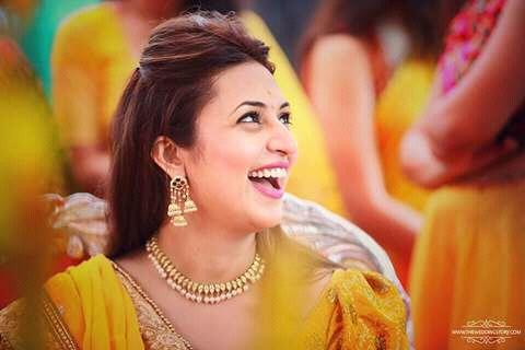 Bollywood actress Divyanka Tripathi glows in yellow at her Haldi ceremony. Divyanka Tripathi,Divyanka Tripathi Haldi ceremony,Divyanka Tripathi in yellow at her Haldi ceremony,Divyanka Tripathi glows in yellow at her Haldi ceremony,Divyanka Tripathi Haldi ceremony pics,Divyanka Tripathi Haldi ceremony images,Divyanka Tripathi Ha