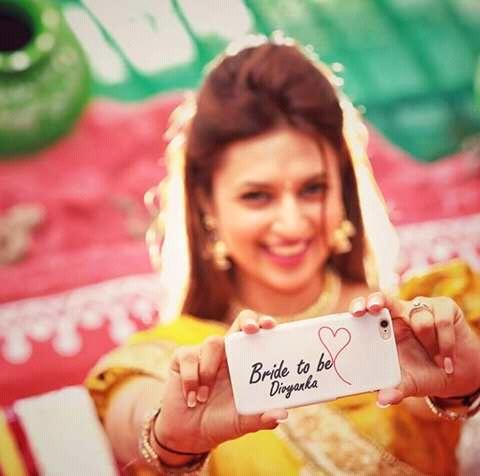 Bollywood actress Divyanka Tripathi glows in yellow at her Haldi ceremony. Divyanka Tripathi,Divyanka Tripathi Haldi ceremony,Divyanka Tripathi in yellow at her Haldi ceremony,Divyanka Tripathi glows in yellow at her Haldi ceremony,Divyanka Tripathi Haldi ceremony pics,Divyanka Tripathi Haldi ceremony images,Divyanka Tripathi Ha