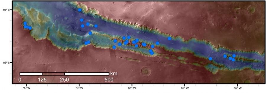 Blue dots on this map indicate sites of recurring slope lineae (RSL) in part of the Valles Marineris canyon network on Mars. RSL are seasonal dark streaks that may be indicators of liquid water. Mars' slope lineae could suggest liquid water,Blue dots,Mars,liquid water,liquid water on Mars,Mars liquid water,liquid water on mars pics