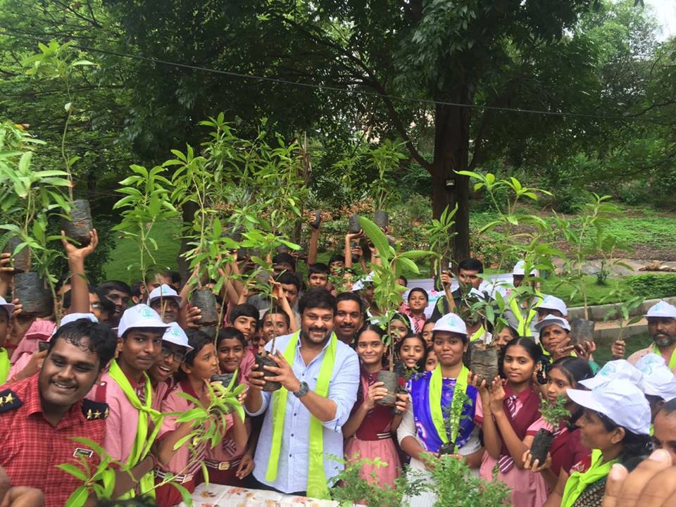 Telugu celebs like Chiranjeevi, Allu Arjun, Sneha Reddy and Ayaan plant saplings as part of Haritha Haram campaign. Chiranjeevi,Allu Arjun,Sneha Reddy,Ayaan,Allu Ayaan,Allu Arjun son Ayaan,Haritha Haram campaign,Allu Arjun with his son,Allu Arjun son,Allu Arjun latest pics,Allu Arjun latest images,Allu Arjun latest photos,Allu Arjun latest stills,Allu Arjun latest pict