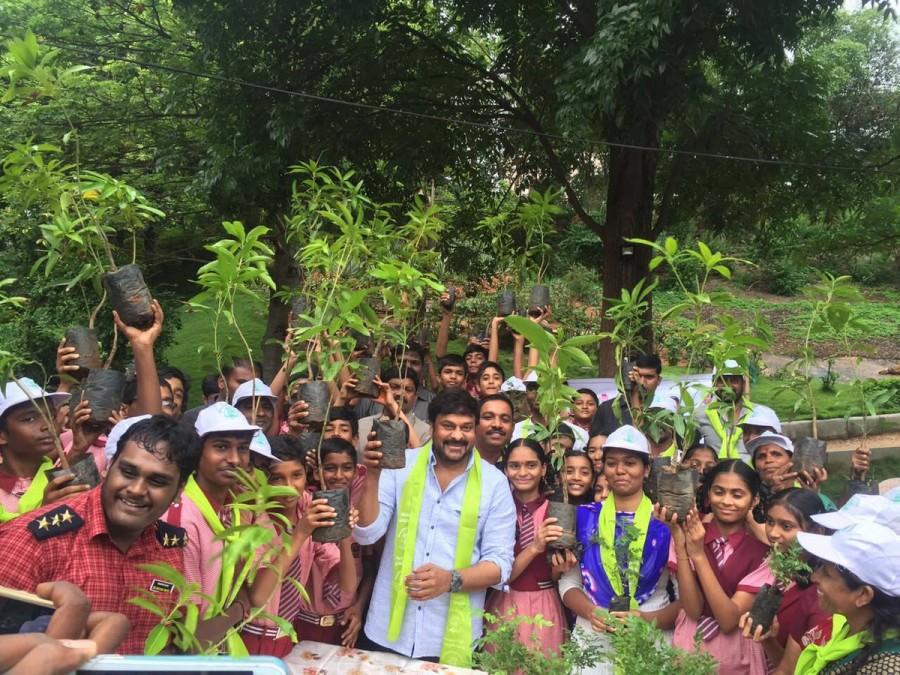 Telugu celebs like Chiranjeevi, Allu Arjun, Sneha Reddy and Ayaan plant saplings as part of Haritha Haram campaign. Chiranjeevi,Allu Arjun,Sneha Reddy,Ayaan,Allu Ayaan,Allu Arjun son Ayaan,Haritha Haram campaign,Allu Arjun with his son,Allu Arjun son,Allu Arjun latest pics,Allu Arjun latest images,Allu Arjun latest photos,Allu Arjun latest stills,Allu Arjun latest pict