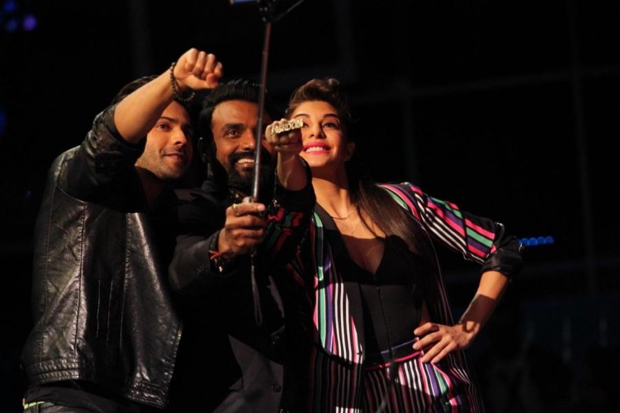 Varun Dhawan and Jacqueline sizzle on Dance + stage with Superjudge Remo D'souza. Dishoom Promotion,Varun Dhawan,Jacqueline,Remo D'souza,Varun Dhawan & Jacqueline,Dishoom Promotion pics,Dishoom Promotion images,Dishoom Promotion photos,Dishoom Promotion stills,Dishoom Promotion pictures