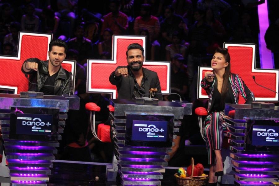 Varun Dhawan and Jacqueline sizzle on Dance + stage with Superjudge Remo D'souza. Dishoom Promotion,Varun Dhawan,Jacqueline,Remo D'souza,Varun Dhawan & Jacqueline,Dishoom Promotion pics,Dishoom Promotion images,Dishoom Promotion photos,Dishoom Promotion stills,Dishoom Promotion pictures