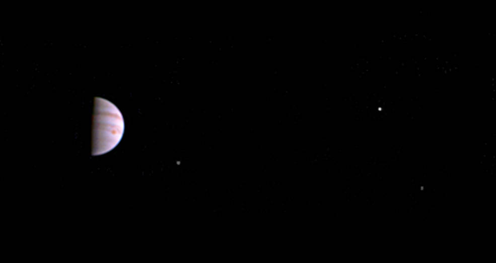 NASA's Juno spacecraft has sent the first-ever image of the gas giant Jupiter and three of its four moons to the Earth as it continues orbiting the planet. NASA,Juno mission,Jupiter,first image of Jupiter,first-ever image,gas giant Jupiter,Juno spacecraft,Great Red Spot,Southwest Research Institute,San Antonio