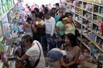 Tens of thousands of Venezuelans cross into Colombia during a temporary opening of the border to allow people to buy much-needed food and medicine.