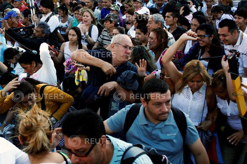 Tens of thousands of Venezuelans cross into Colombia during a temporary opening of the border to allow people to buy much-needed food and medicine. Venezuelans,Colombia,Venezuelans stock up in Colombia,border,much-needed food,medicine