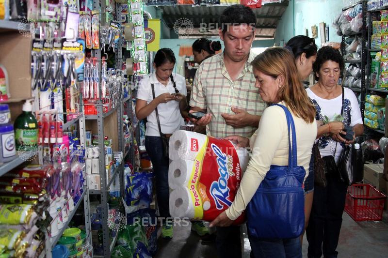 Tens of thousands of Venezuelans cross into Colombia during a temporary opening of the border to allow people to buy much-needed food and medicine. Venezuelans,Colombia,Venezuelans stock up in Colombia,border,much-needed food,medicine
