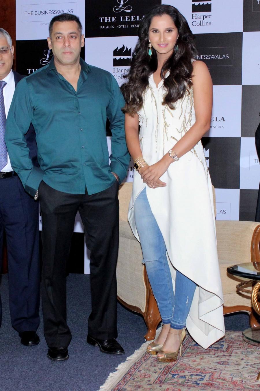 Bollywood actor Salman Khan launches Sania Mirza's autobiography. Salman Khan,Sania Mirza's autobiography,Salman Khan launches Sania Mirza's autobiography,Sania Mirza,Sania Mirza autobiography,Salman Khan and Sania Mirza,Salman Khan pics,Salman Khan images,Salman Khan photos,Salman Khan stills,Salman Khan pict
