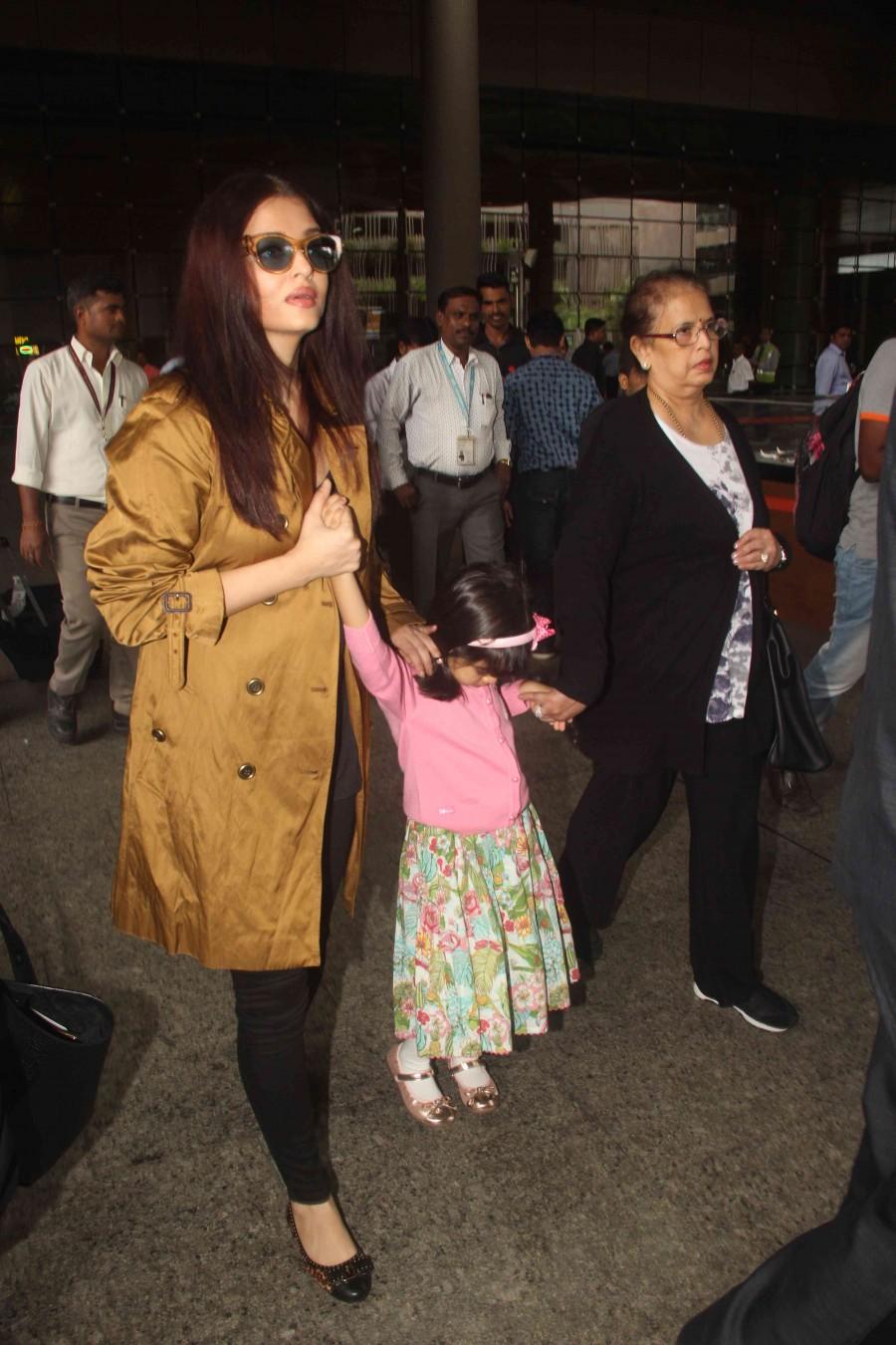 Bollywood actress Aishwarya Rai Bachchan and Deepika Padukone spotted at airport. Aishwarya Rai Bachchan,Aishwarya Rai,Aishwarya Rai Bachchan with daughter,Aishwarya Rai Bachchan at airport,Aishwarya Rai at airport,Deepika Padukone spotted at airport,Deepika Padukone at airport,Deepika Padukone,Deepika Padukone pics,Deepika Padukone im
