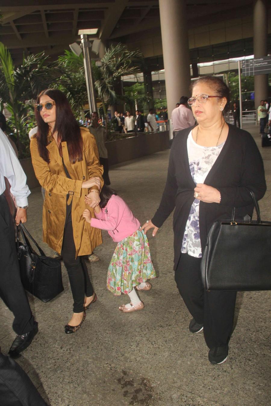 Bollywood actress Aishwarya Rai Bachchan and Deepika Padukone spotted at airport. Aishwarya Rai Bachchan,Aishwarya Rai,Aishwarya Rai Bachchan with daughter,Aishwarya Rai Bachchan at airport,Aishwarya Rai at airport,Deepika Padukone spotted at airport,Deepika Padukone at airport,Deepika Padukone,Deepika Padukone pics,Deepika Padukone im