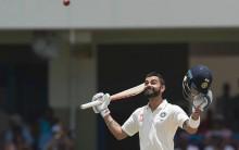 Virat Kohli completed a superb double century as India posted 404/4 at lunch on the second day of the first Test at the Sir Vivian Richards Stadium here on Friday.
