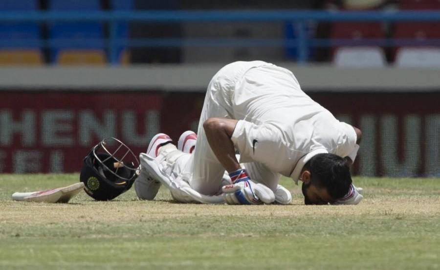 Virat Kohli completed a superb double century as India posted 404/4 at lunch on the second day of the first Test at the Sir Vivian Richards Stadium here on Friday. Virat Kohli,Virat Kohli hits maiden double century,Virat Kohli hits double century,Virat Kohli double century,Sir Vivian Richards Stadium,Virat Kohli 200,Virat Kohli in Antigua,Virat Kohli pics,Virat Kohli images,Virat Kohli photos,Virat Kohli stills,Vira