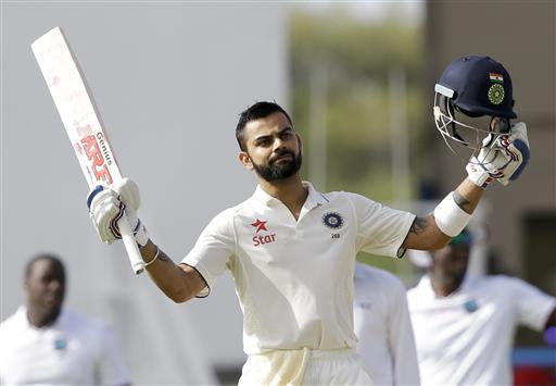 Virat Kohli completed a superb double century as India posted 404/4 at lunch on the second day of the first Test at the Sir Vivian Richards Stadium here on Friday. Virat Kohli,Virat Kohli hits maiden double century,Virat Kohli hits double century,Virat Kohli double century,Sir Vivian Richards Stadium,Virat Kohli 200,Virat Kohli in Antigua,Virat Kohli pics,Virat Kohli images,Virat Kohli photos,Virat Kohli stills,Vira