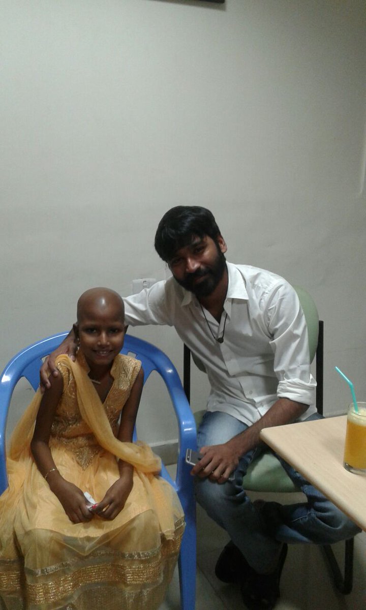 South Indian actor Dhanush meets blood cancer patient Kotiswari. Dhanush,Dhanush meets blood cancer patient Kotiswari,Dhanush meets Kotiswari,Kotiswari blood cancer patient,actor Dhanush,Dhanush latest pics,Dhanush latest images,Dhanush latest photos,Dhanush latest stills,Dhanush latest pictures