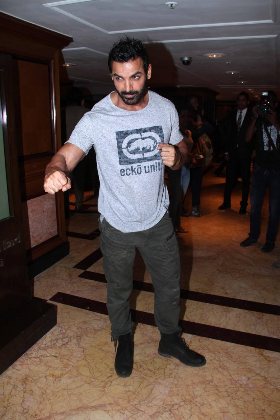 Bollywood actor John Abraham poses during the Meet & Greet session of the finale of Dumdaar Dishoom Challenge contest Dishoom with Sofit in Mumbai. John Abraham,Dumdaar Dishoom Challenge,Dishoom Challenge,Dishoom Challenge with John Abraham,Dishoom promotion,John Abraham latest pics,John Abraham images,John Abraham latest photos,John Abraham latest stills,John Abraham latest pictures