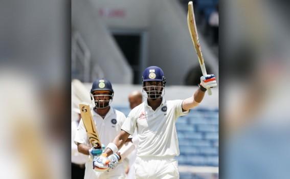 India scored 358 at the loss of five wickets and gained a lead of 162 runs at the end of Day 2 of the second Test against West Indies at Sabina Park here on Sunday.