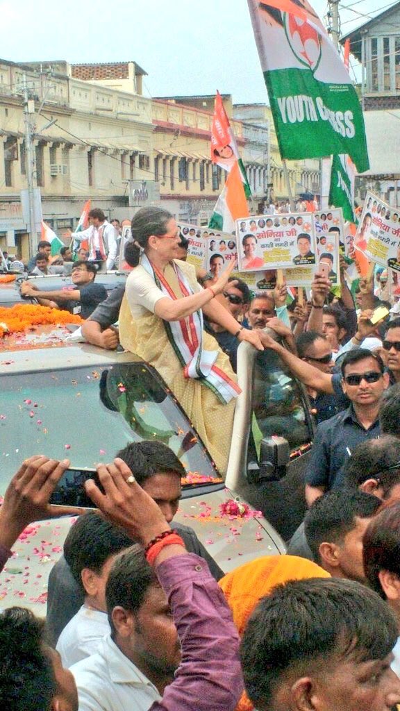 Congress President Sonia Gandhi arrived to a rousing welcome here on Tuesday, with party workers lining up both sides of the road from the airport and raising slogans hailing her. Sonia Gandhi,UP campaign,Sonia Gandhi roadshow in Varanasi,Sonia Gandhi in Varanasi,Varanasi,Congress President Sonia Gandhi