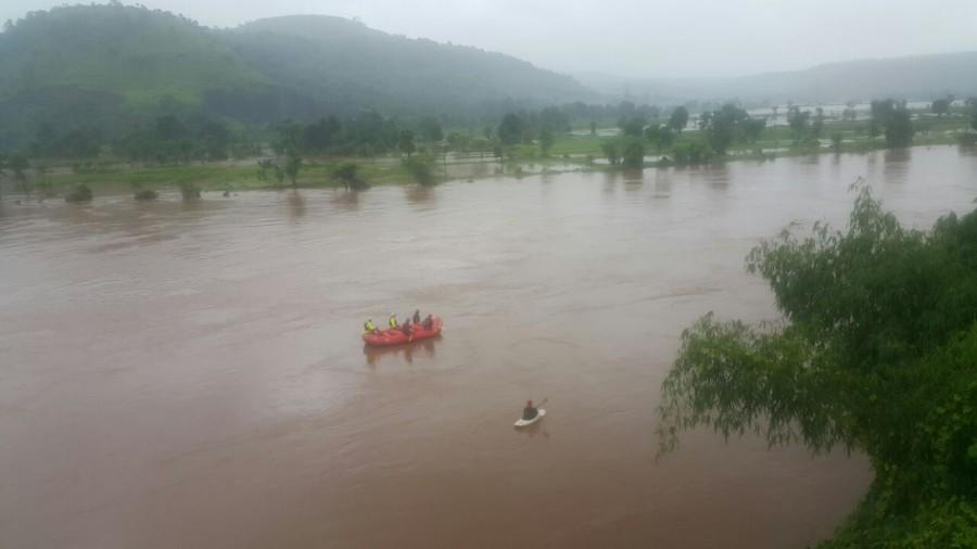 At least two buses with about 22 passengers were washed away early on Wednesday in flood waters after a bridge collapse on the Mumbai-Goa Highway, an official said. Mumbai-Goa highway bridge collapse,bridge collapse,highway bridge collapse,flood waters,bridge collapse in Mumbai-Goa Highway,bridge collapse in Mumbai Highway,bridge collapse in Goa Highway