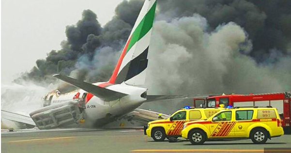 An Emirates plane flying from Kerala with 275 people on board caught fire after landing here on Wednesday, leaving the passengers and crew shaken and many injured, witnesses and officials said. A part of the engine of the Boeing 777 appeared to have fallen off after the violent landing at the Dubai International Airport, which was immediately shut for all landings and take-offs. Emirates flight crash,Emirates flight crash at Dubai Airport,Emirates flight,flight crash,Dubai Airport