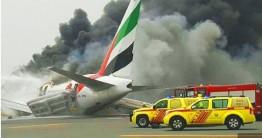 An Emirates plane flying from Kerala with 275 people on board caught fire after landing here on Wednesday, leaving the passengers and crew shaken and many injured, witnesses and officials said. A part of the engine of the Boeing 777 appeared to have fallen off after the violent landing at the Dubai International Airport, which was immediately shut for all landings and take-offs.