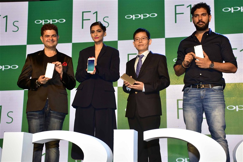 Indian cricket player Yuvraj Singh and Bollywood actor Sonam Kapoor during the launch of Oppo F1S smartphone. Sonam Kapoor,Yuvraj Singh,Oppo F1s Smartphone Launch,Oppo F1s Smartphone,Oppo F1s,cricket player Yuvraj Singh,Oppo F1s launch,Oppo F1s launch pics,Oppo F1s launch images,Oppo F1s launch photos,Oppo F1s launch stills,Oppo F1s launch pictures