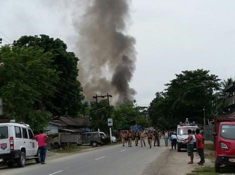 Eight to 12 people were killed on Friday when suspected militants opened random fire at a busy market in Kokrajhar town in Assam, police said.