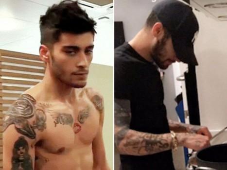Singer Zayn Malik has covered up the tattoo of his former girlfriend Perrie Edwards.