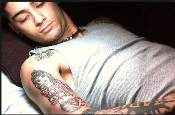 Singer Zayn Malik has covered up the tattoo of his former girlfriend Perrie Edwards. Singer Zayn Malik,Zayn Malik,Zayn Malik tattoo,Perrie Edwards tattoo,Zayn Malik covers up Perrie Edwards tattoo,former girlfriend Perrie Edwards