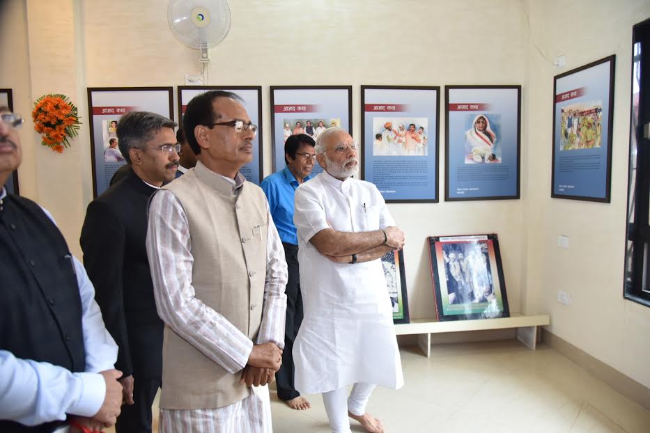 Prime Minister Narendra Modi on Tuesday paid homage to Chandrashekar Azad at the freedom fighter's birthplace Bhabra in Madhya Pradesh and became the first Prime Minister to visit the village. Prime Minister Narendra Modi,Narendra Modi,Chandrashekhar Azad,freedom fighter,Madhya Pradesh,PM Modi,PM Narendra Modi,first Prime Minister