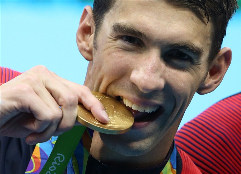 Michael Phelps claimed his 20th Olympic gold medal by winning the men's 200m butterfly final at the Rio Olympics on Tuesday. Michael Phelps,Michael Phelps wins Gold,Michael Phelps wins Gold Medal,Michael Phelps wins 20th Olympic gold medal,Michael Phelps gold,Michael Phelps Rio Olympics 2016,michael phelps Rio Olympics,Michael Phelps pics,Michael Phelps images,Michael Phelps ph