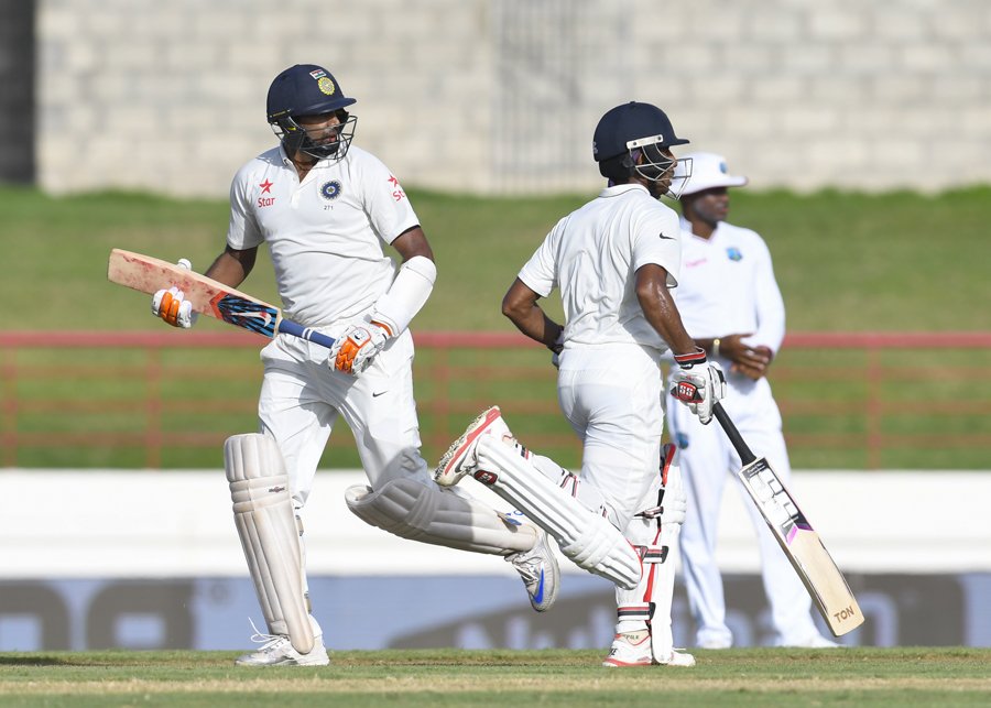 With an unbeaten 108-run sixth wicket partnership, Ravichandran Ashwin and wicket-keeper Wriddhaman Saha brought India back into the game to post 234 for 5 wickets against a domineering West Indies on the first day of the third Test at the Darren Sammy National Cricket Stadium here on Tuesday. Ravichandran Ashwin,Wriddhaman Saha,Ashwin,Saha,Ind vs WI,Ind vs WI test match,Ind vs WI 3rd test match,Ind vs WI third test match,Ind vs WI third Test,Test Cricket
